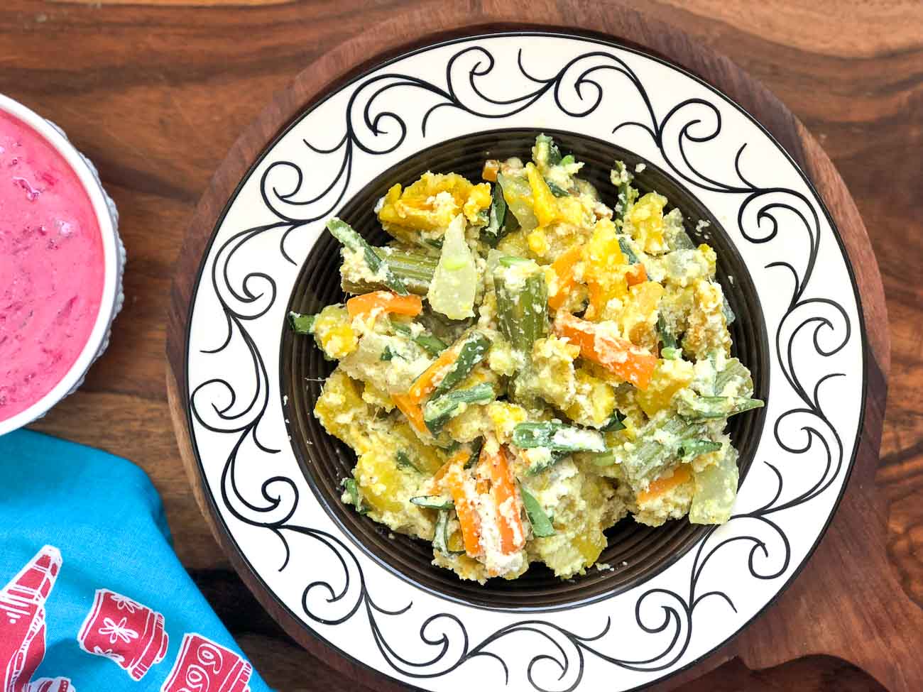 Aviyal Aviyal Prepared, garnished and served in a plate